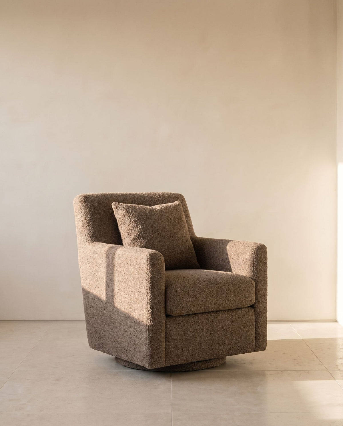 Monet Swivel Chair in taupe wool bouclé