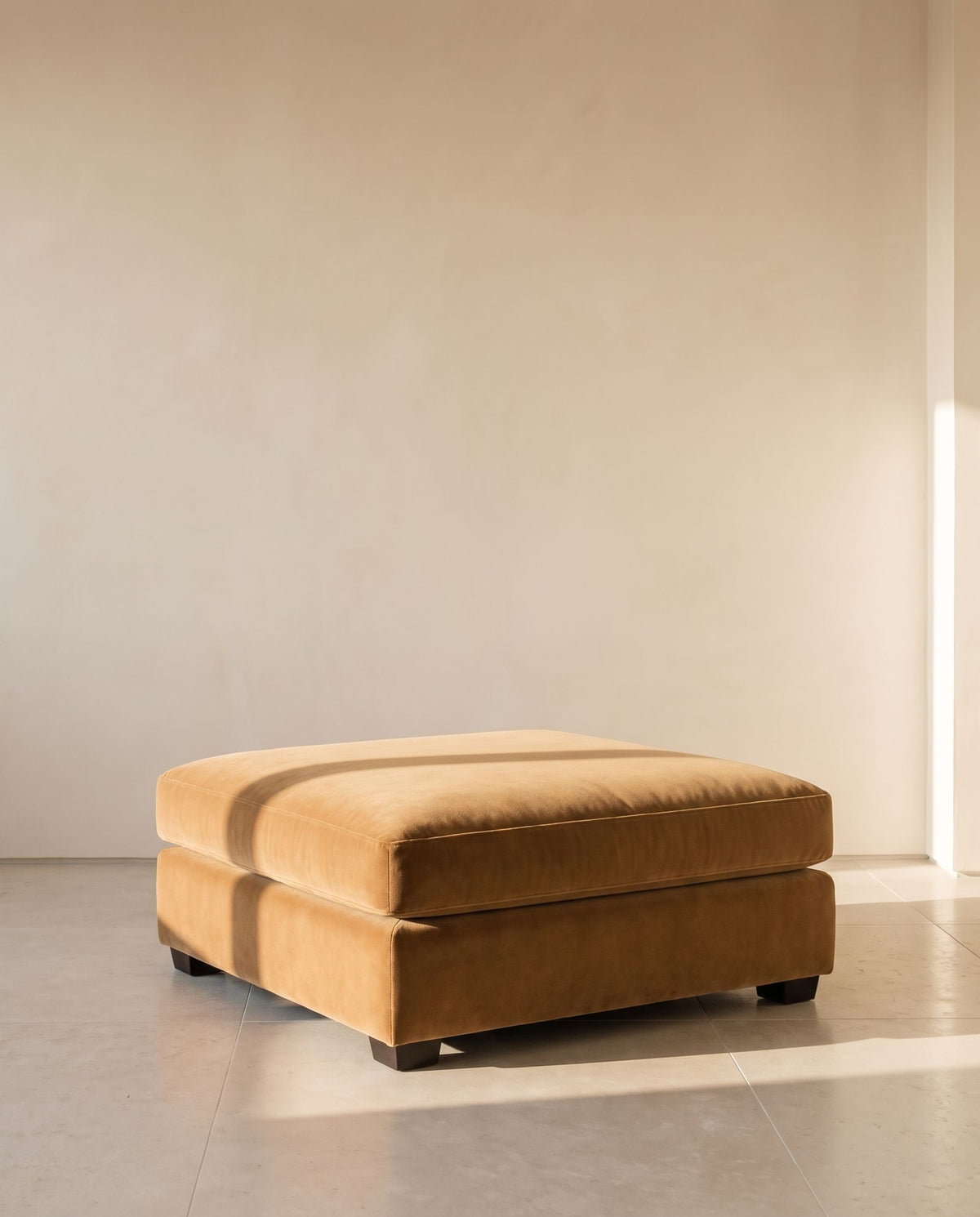 Paloma Ottoman in camel mohair velvet