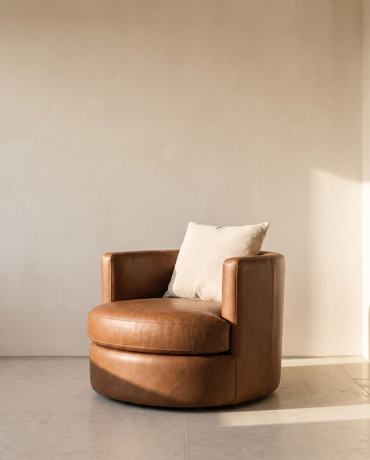 Sylvia Swivel Chair in tobacco leather